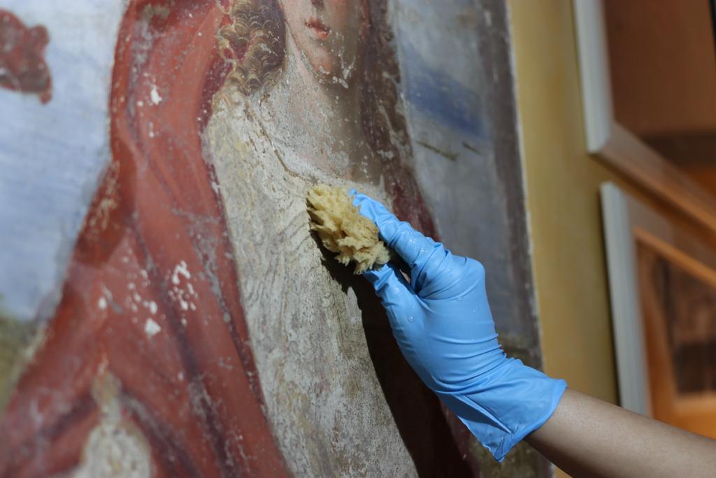 Wall painting conservation in progress at Hotel Mia Cara