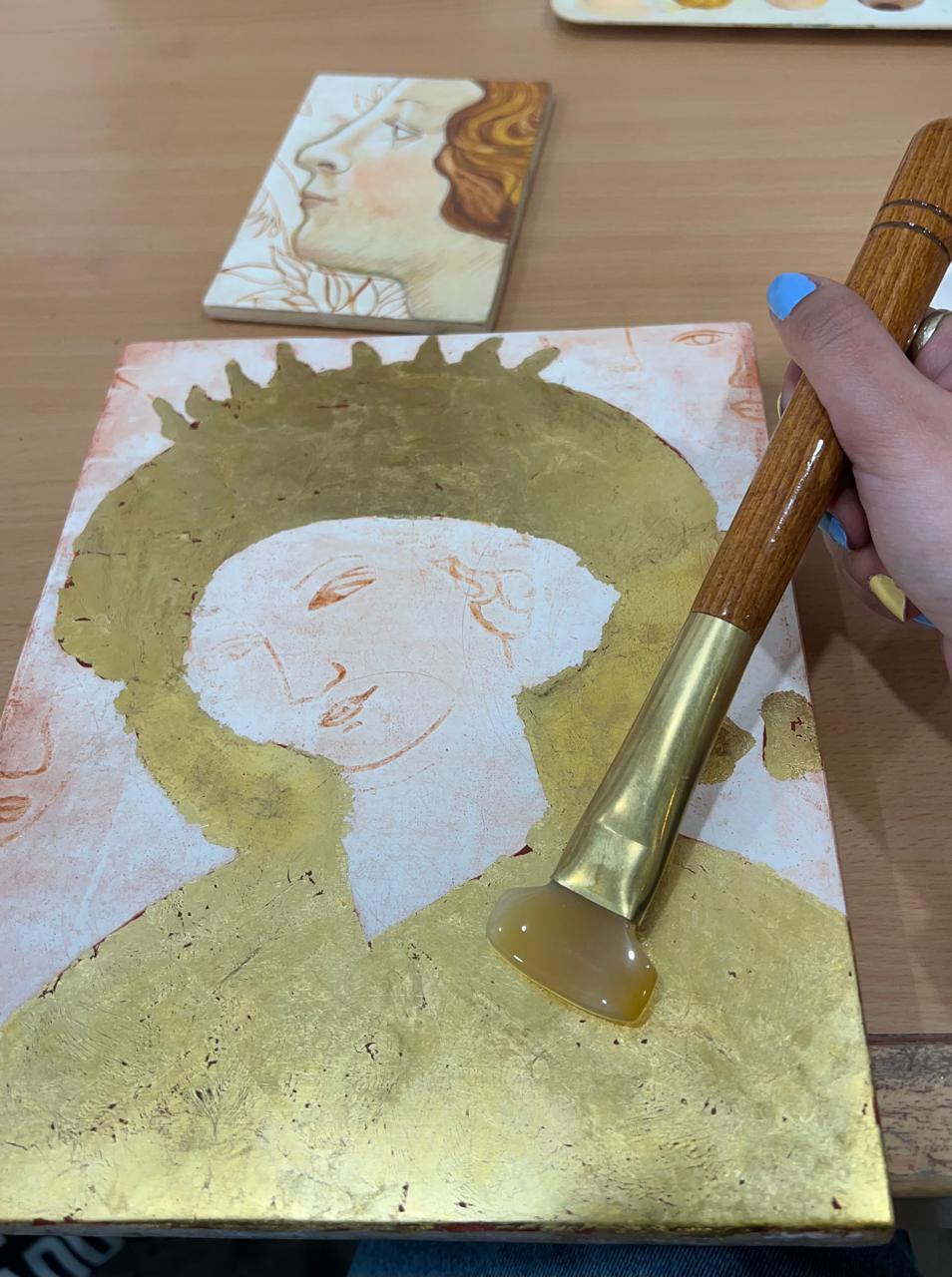 Polishing the gold leaf